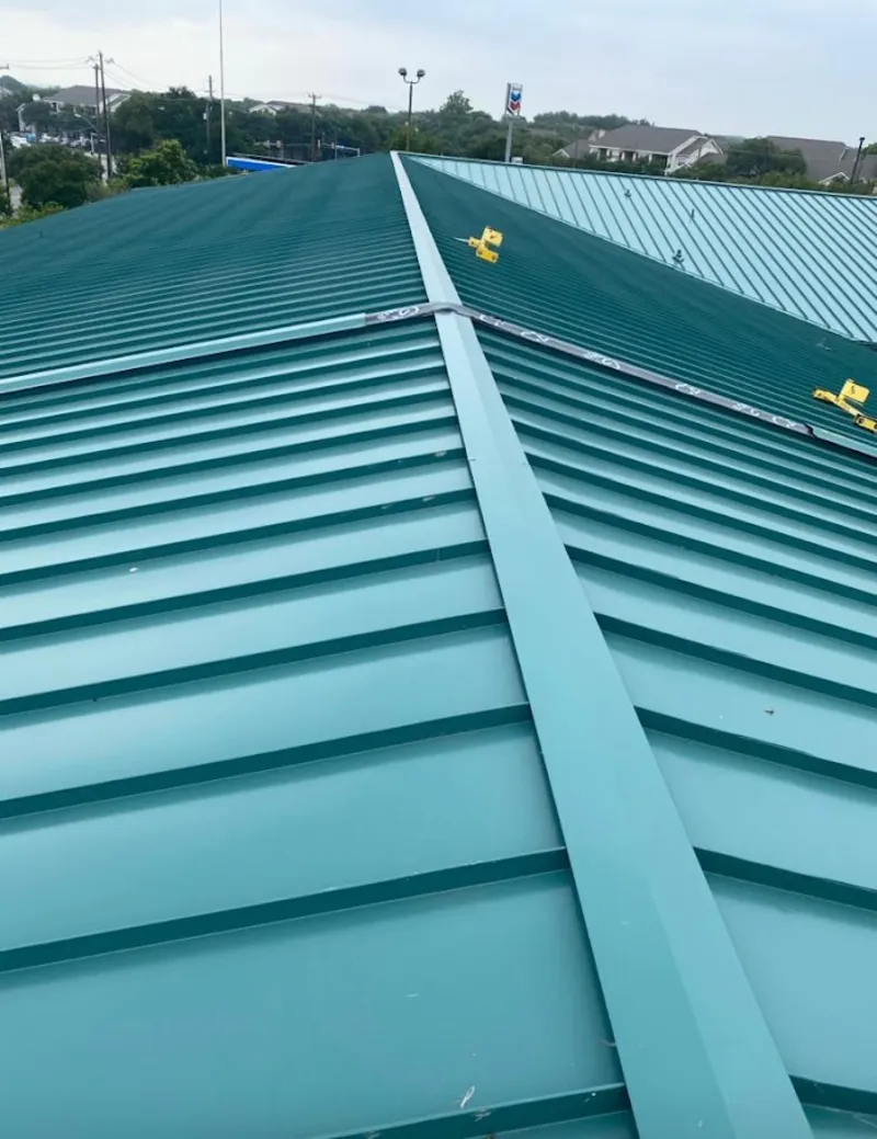 Green commercial metal roof ridge and valley for Metal Roof Repair in Magnolia